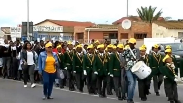 People marching in uniform