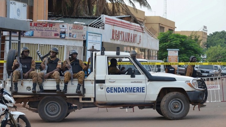 Burkina Faso holds mass burial for slain military police officers ...