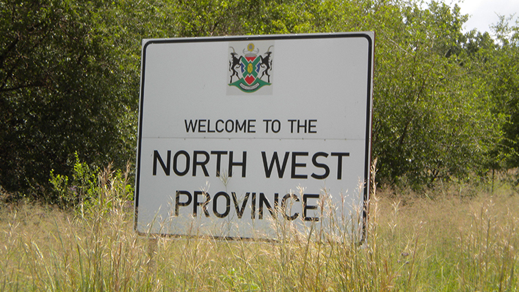 'Welcome to North West Province' signboard.