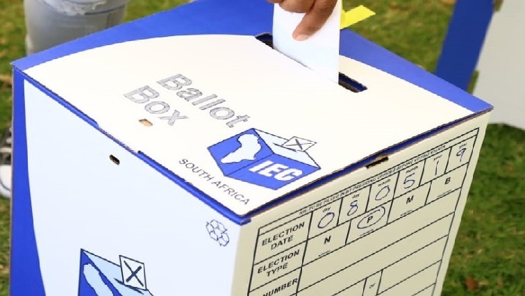 Ballot paper going into the ballot box