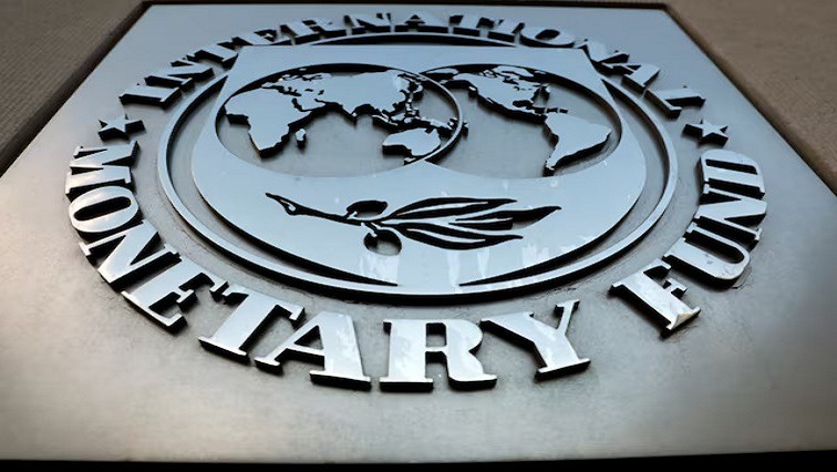 The International Monetary Fund (IMF) logo is seen outside the headquarters building in Washington, U.S.,