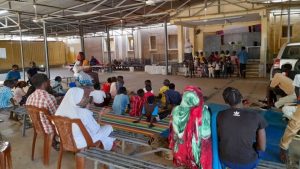 Refugees attend an event at "Dar Mariam" a Catholic church and school compound in al-Shajara district, where they took shelter, in Khartoum, Sudan.